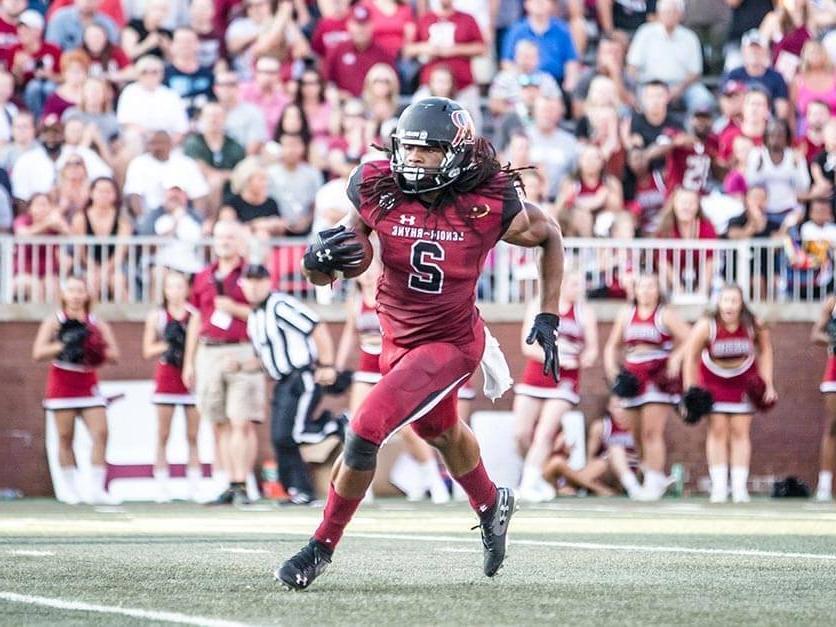 Former LR star Kyle Dugger running with the football